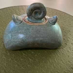 Hand thrown stoneware vessel.